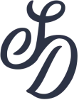 A stylized cursive logo or monogram, likely a decorative letter “E” or “S” entwined, on a dark background, with a blue-gray color.